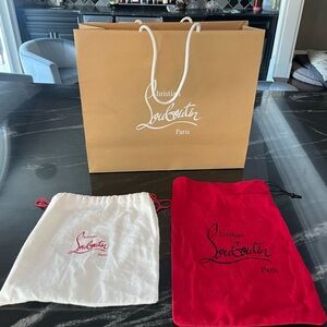 Christian Louboutin shopping bag with red & white dust bags